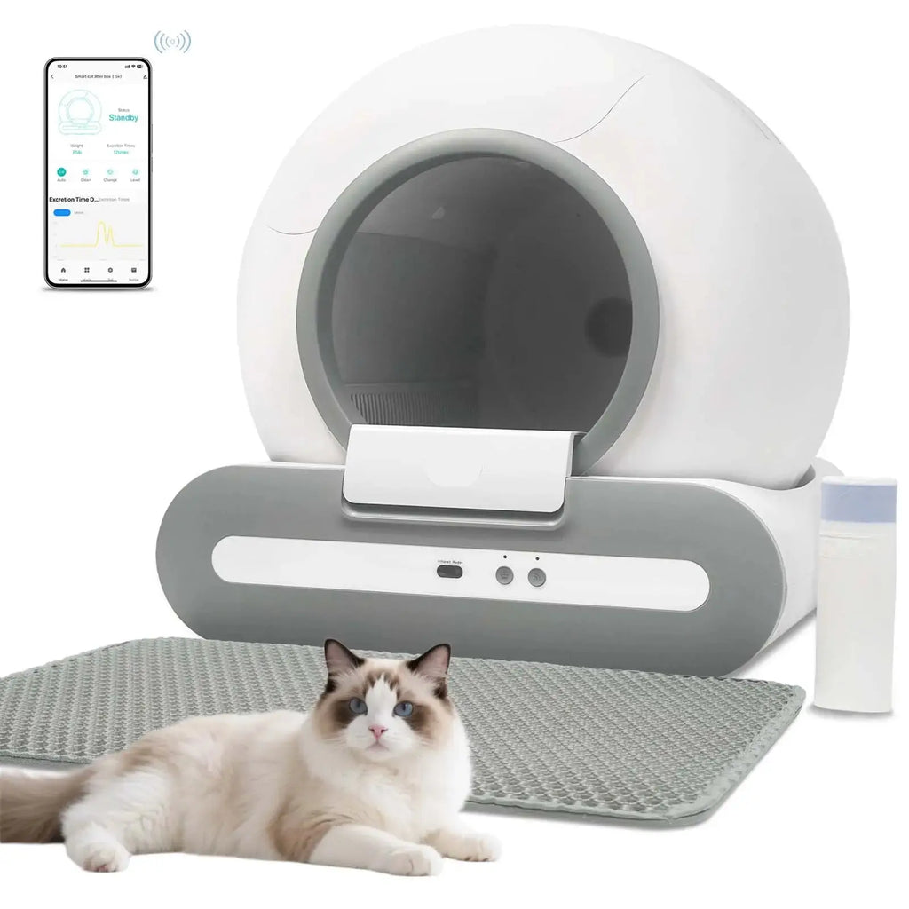 Smart pet litter box with a cat lying on the mat and a smartphone app displayed.